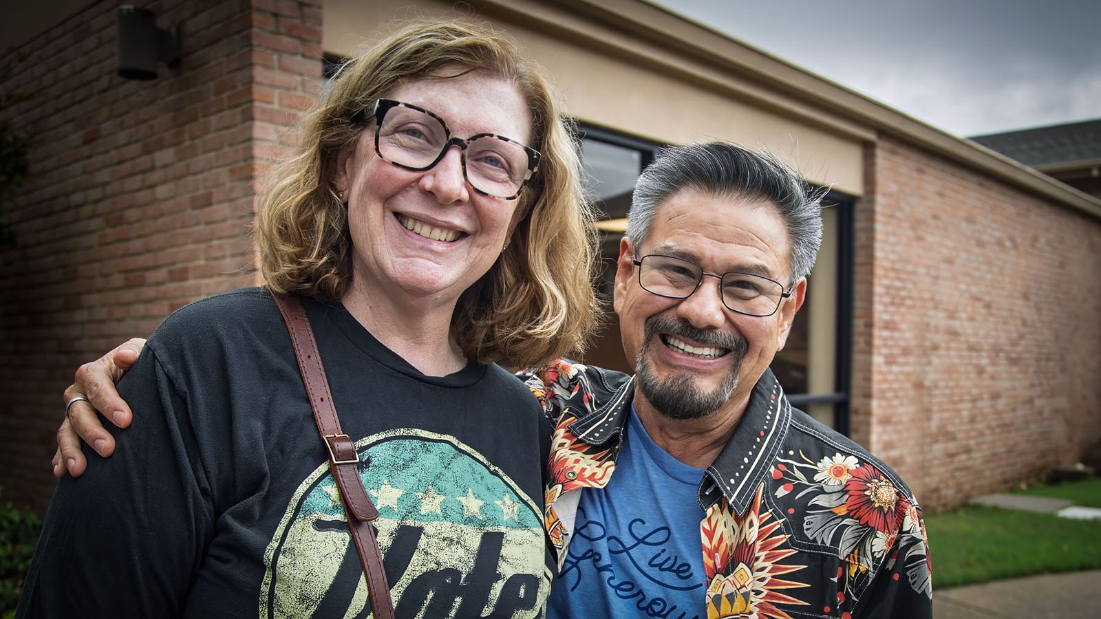 Two members smiling at the Fall Festival
