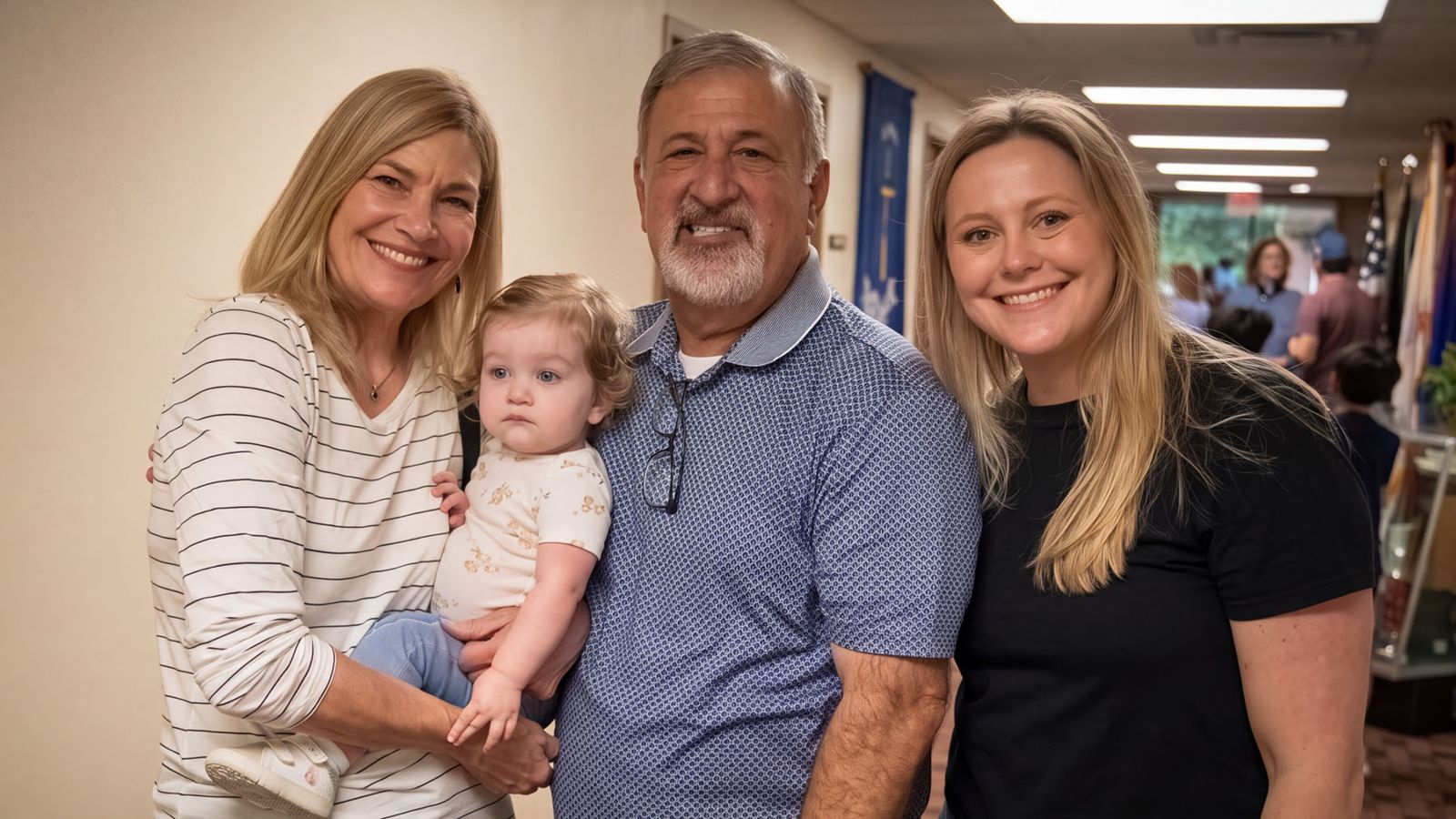 A family with their baby at the Fall Festival