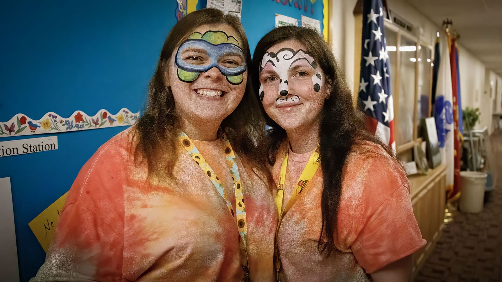 Volunteers in face paint at the Fall Festival